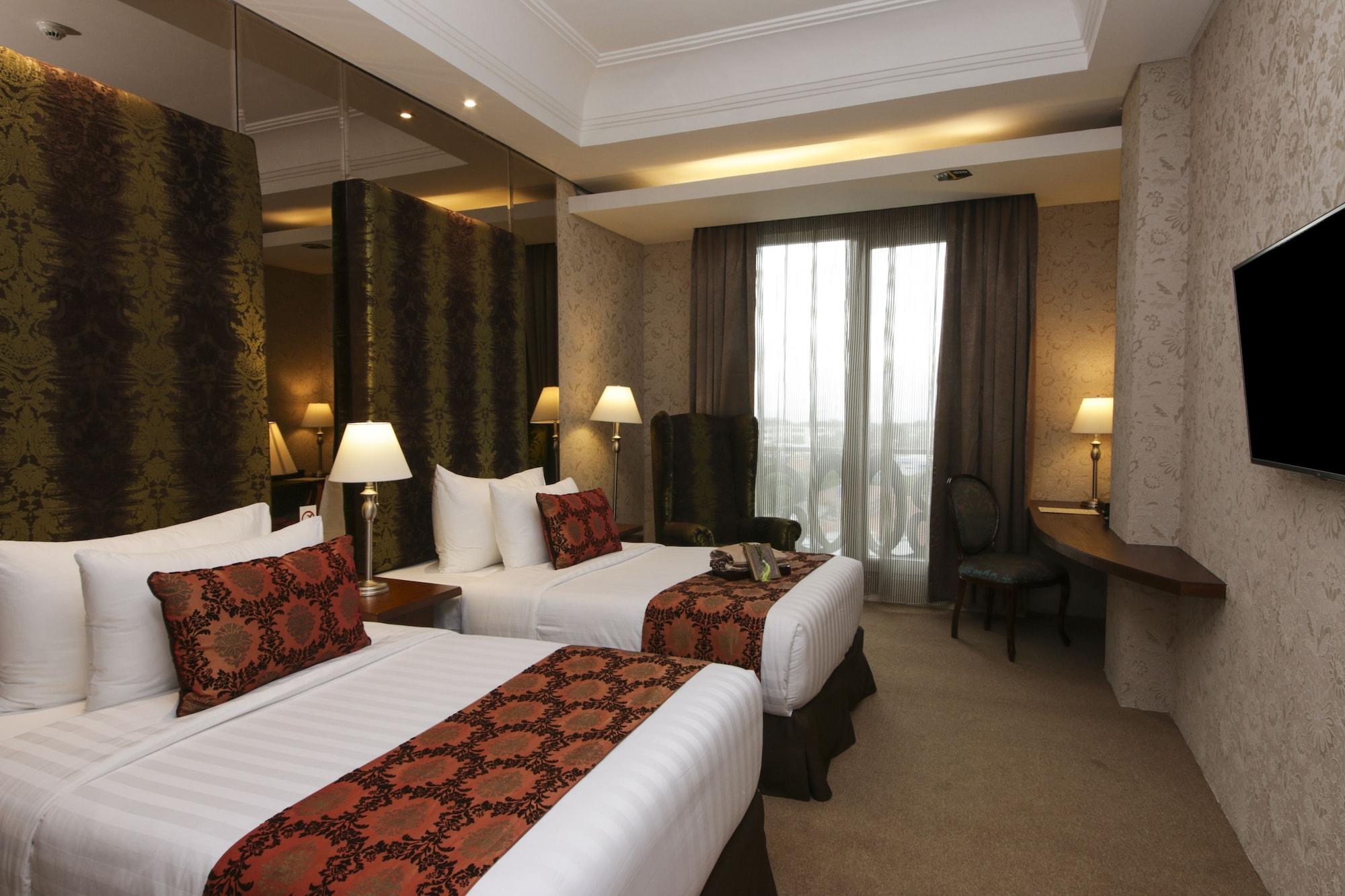 Cinnamon Hotel Boutique Syariah Tutugan Kültér fotó