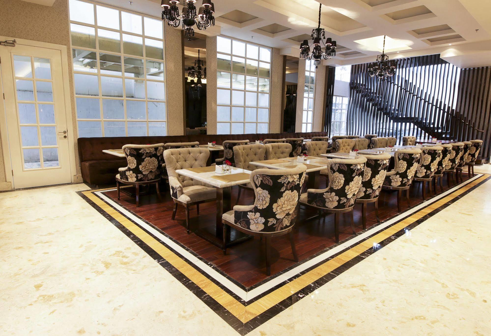 Cinnamon Hotel Boutique Syariah Tutugan Kültér fotó