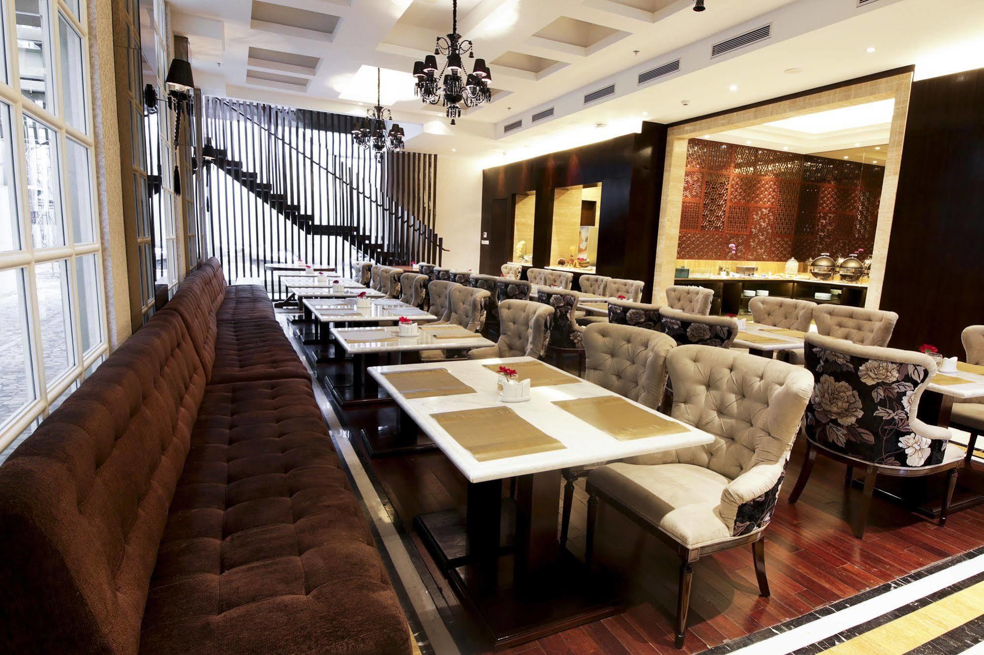 Cinnamon Hotel Boutique Syariah Tutugan Kültér fotó