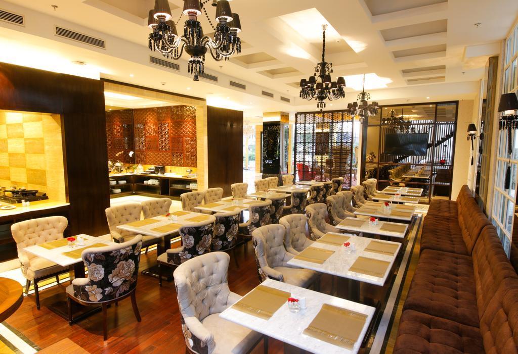 Cinnamon Hotel Boutique Syariah Tutugan Kültér fotó
